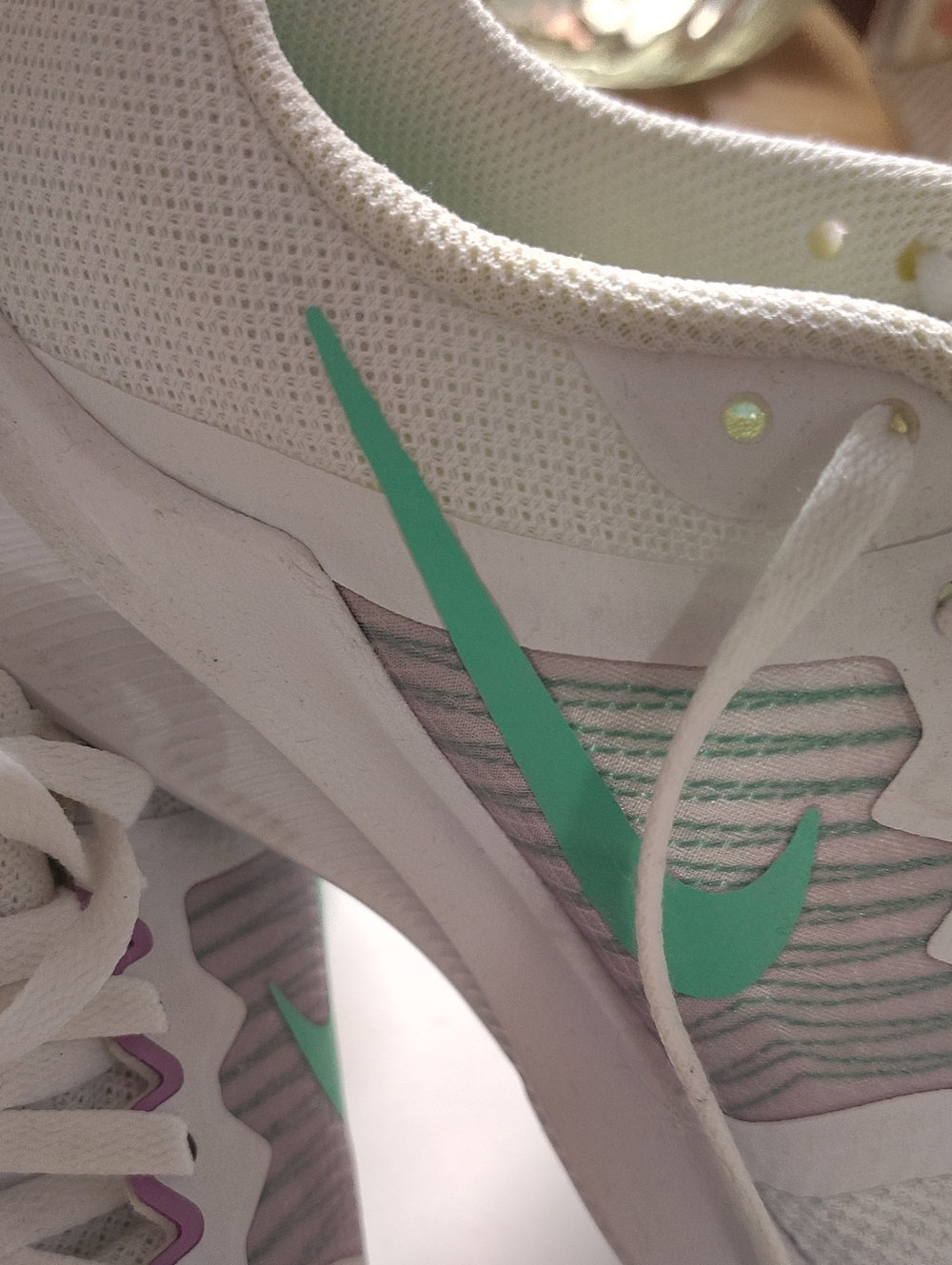 Nike Women’s White Sneakers with Mint Green Swoosh